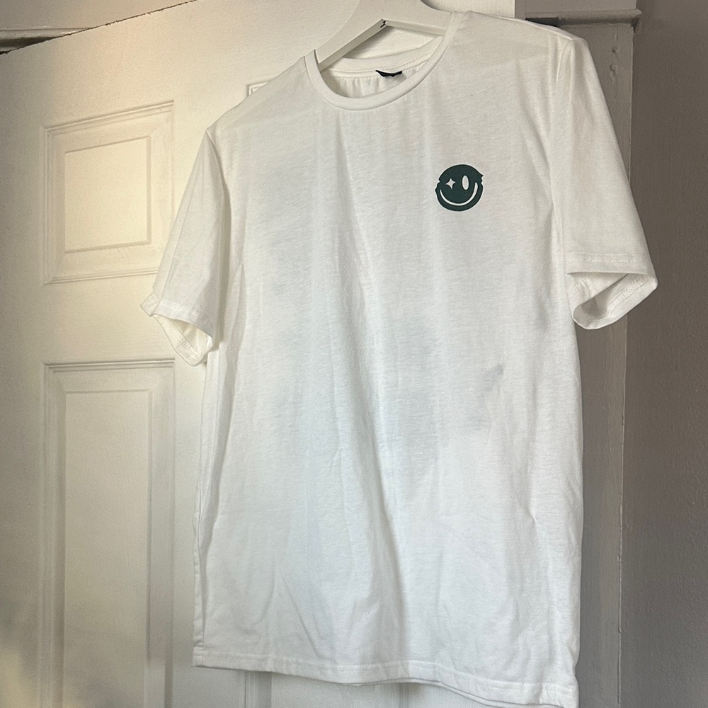 White Short Sleeve Tee with Dark Green Smiley Chest Graphic